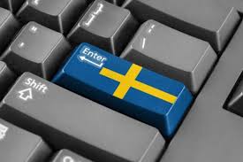 tangentbord med svensk flagga på enter-knappen